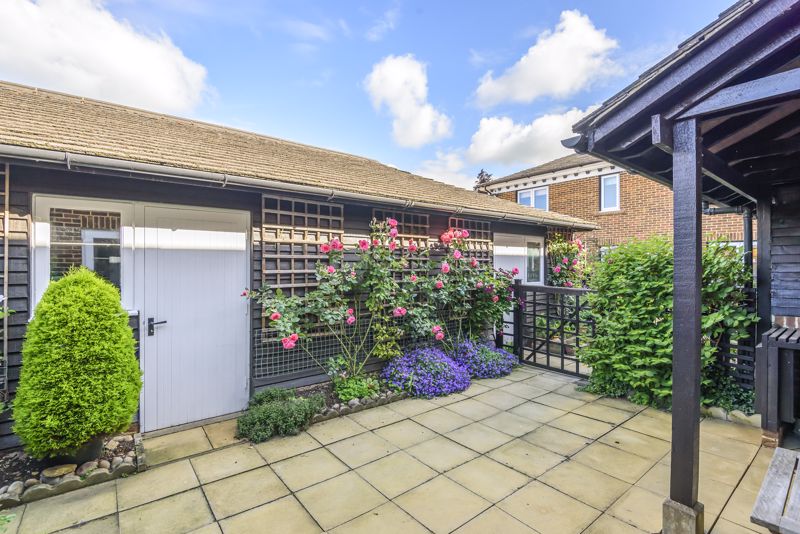 Patio garden with adjacent garage- click for photo gallery